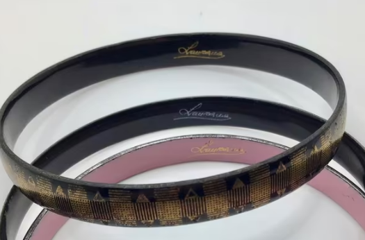 Vintage armband emaille Laureana gemerkt 2 stuks roze zwart 