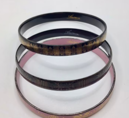 Vintage armband emaille Laureana gemerkt 2 stuks roze zwart 